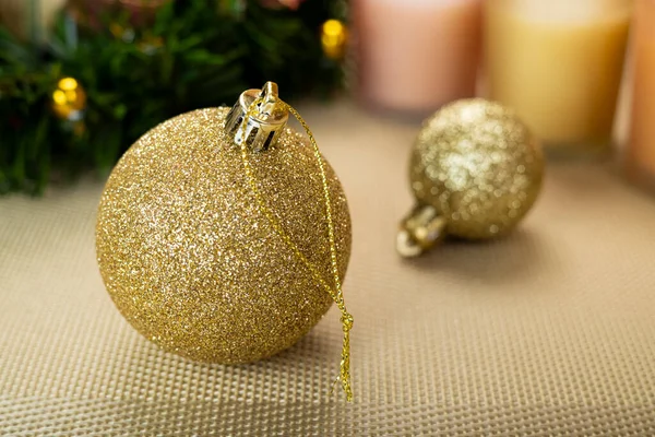 Close Golden Christmas Baubles Metallic Yellow Background — Stock Photo, Image
