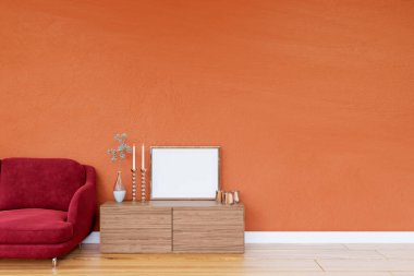 Turuncu duvarlı oturma odası ve çerçeveli kırmızı kanepe. 3d resimlendirme.