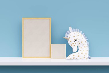 Picture frame mockup with a unicorn pillow on blue wall. 3d rendered illustration.