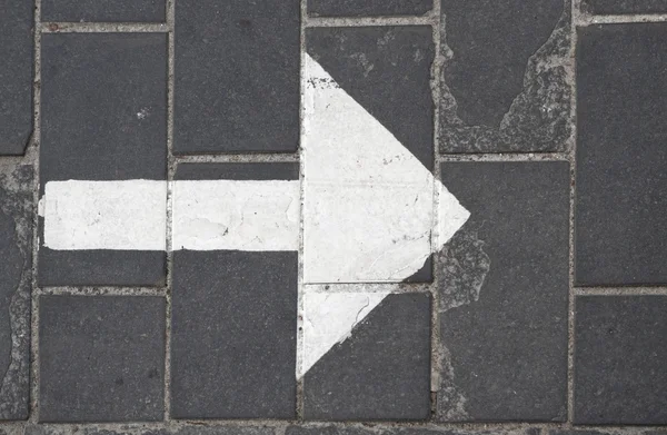 Arrow on the pavement — Stock Photo, Image