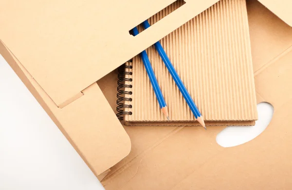 Notepad, pencils and paper folder — Stock Photo, Image