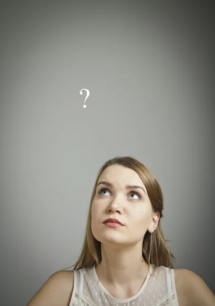 Girl in white. Question mark. — Stock Photo, Image