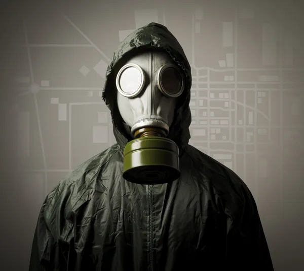 Gas mask and a city map — Stock Photo, Image