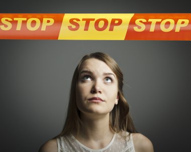 Girl in white and STOP line. clipart