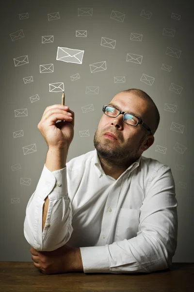 Man in white and letters. — Stock Photo, Image