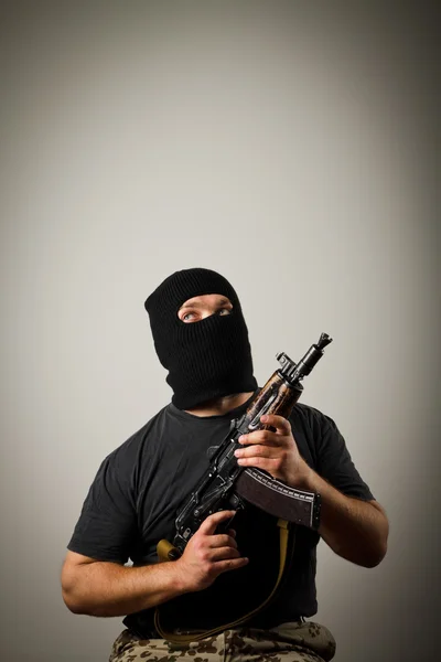 Man with gun — Stock Photo, Image