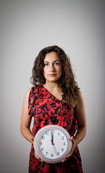 Girl and clock. — Stock Photo, Image