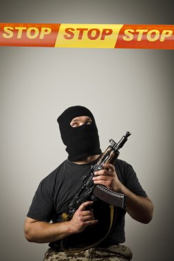 Man with gun and STOP line. clipart