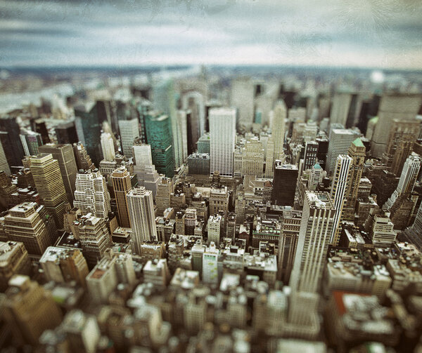 Midtown and lower Manhattan in New York City with grunge vintage overlay effect