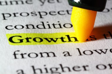 Sarı bir marker ile vurgulanan kelime büyüme