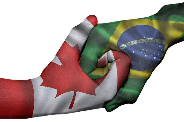 Aperto de mão entre Canadá e Brasil — Fotografia de Stock