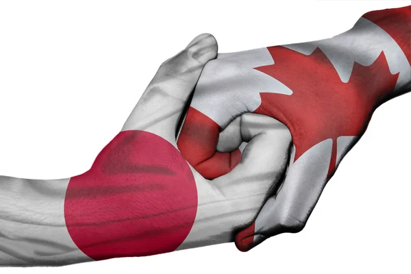 日本和加拿大之间的握手 — 图库照片