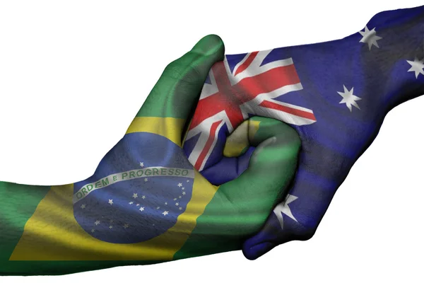 Рукопожатие Бразилии и Австралии — стоковое фото