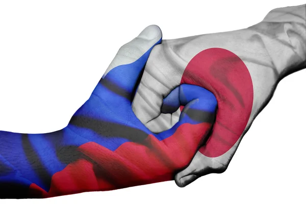 Handshake between Russia and Japan — Stock Photo, Image