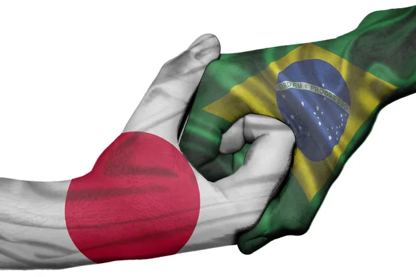 Aperto de mão entre Japão e Brasil — Fotografia de Stock