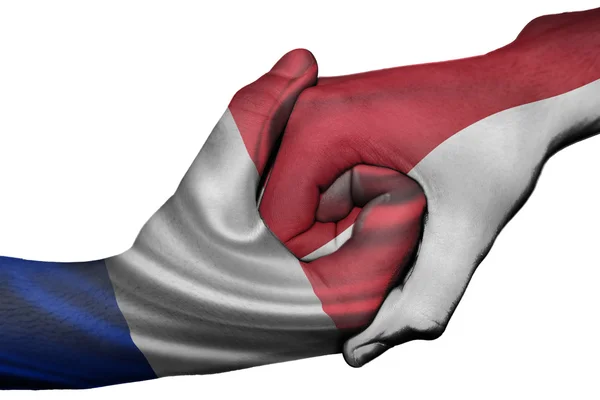 Händedruck zwischen Frankreich und Indonesien — Stockfoto