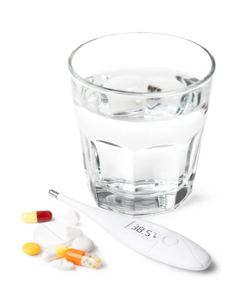 Glass of water and pills — Stock Photo, Image