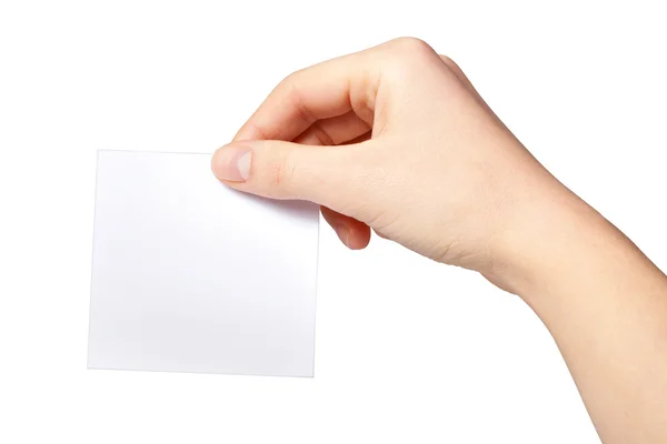 Mano de mujeres sosteniendo etiqueta de papel en blanco Imagen de stock