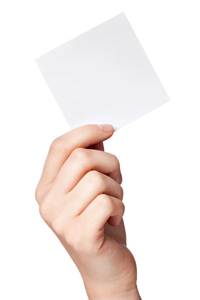 Рука женщины с чистой бумажной этикеткой — стоковое фото