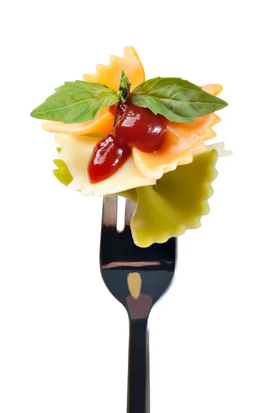 Pasta farfalle with sauce on a fork — Stock Photo, Image