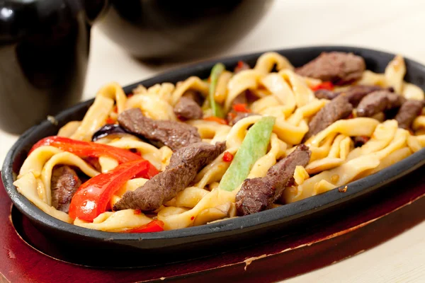 Noodles with beef — Stock Photo, Image