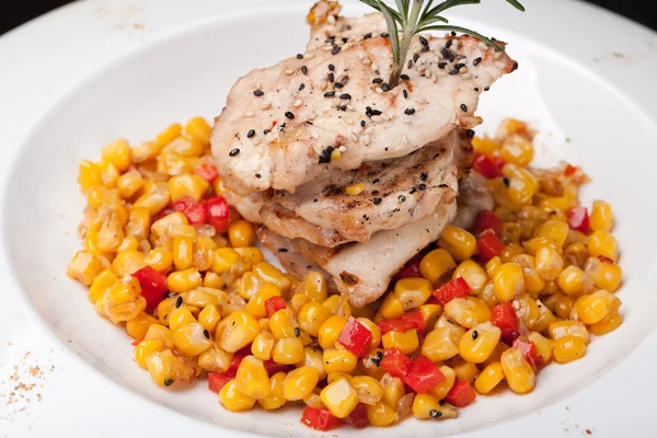 Closeup of fried meat and corn — Stock Photo, Image