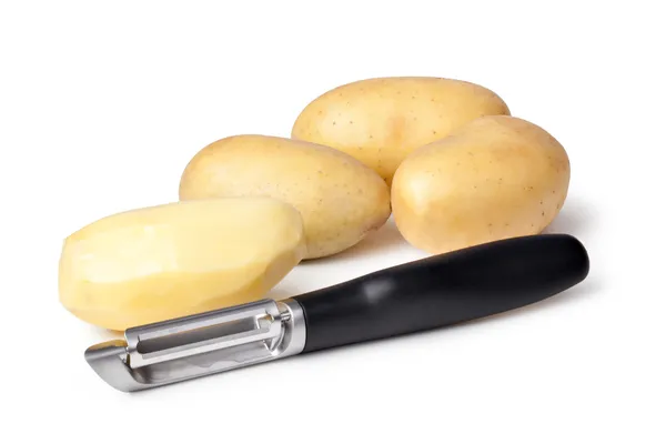 Patate e pelapatate — Foto Stock