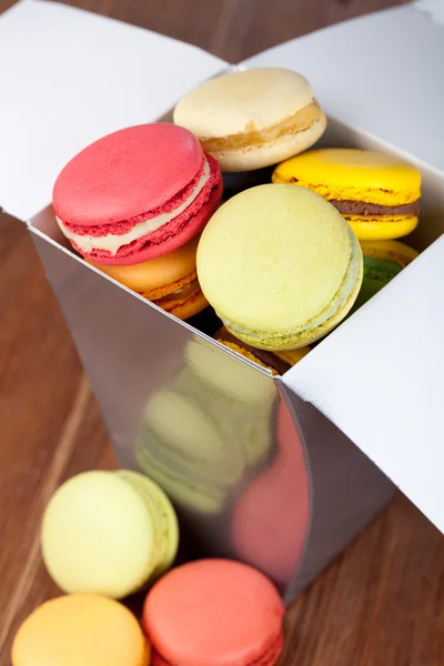 Macaroons on a wooden table — Stock Photo, Image