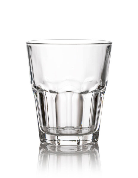 Glass of drinking whiskey isolated on a white background