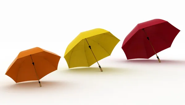 Drie veelkleurige parasols — Stockfoto