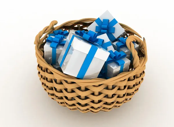 Gift boxes in a braiding basket on a white background — Stock Photo, Image