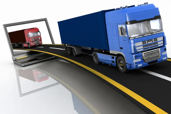 Trucks on freeway coming out of a laptop — Stock Photo, Image