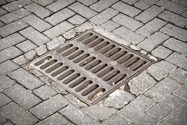 Sewer in a street — Stock Photo, Image