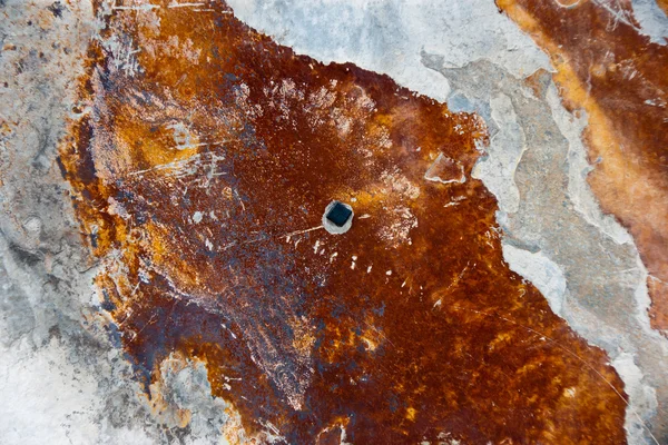 Hintergrund aus schmieriger Steinmauer — Stockfoto