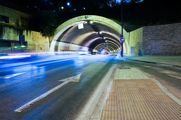 Car lights trail in a tunnel in Malaga, Spain — Stock Photo, Image