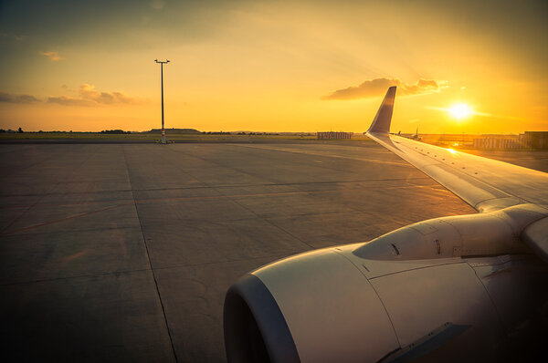 plane at sunset