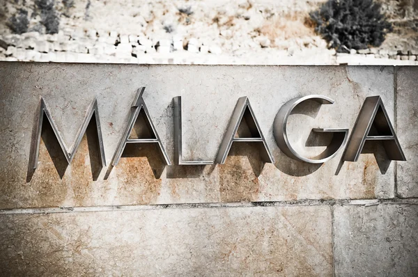 Malaga-logo i gate, Spania – stockfoto