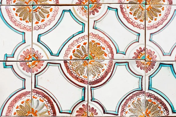 Old spanish ceramic tiles wall decoration Stock Photo