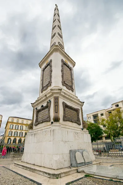 MALAGA, SPAIN - MARCH 01: Merced Square in the center of the city on March 01, 2014 in Malaga, Spain. View of General Torrijos obelisk. — Stock Photo, Image