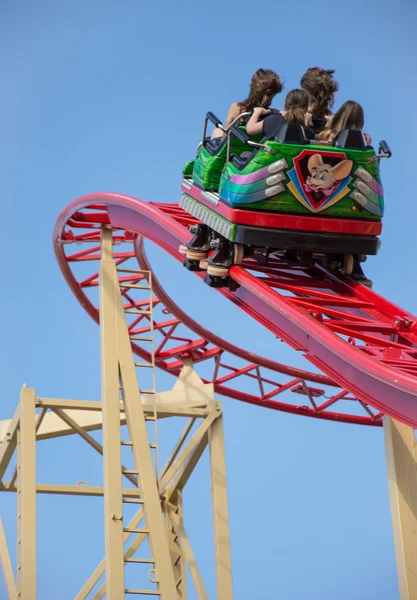 Peoples riding on a rollercoaster — Stock Photo, Image