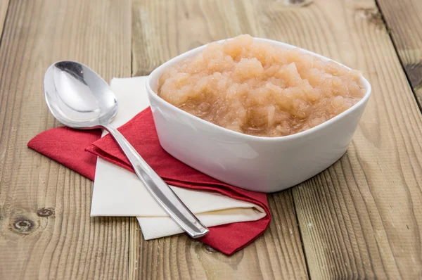 Applesauce on wooden background — Stock Photo, Image