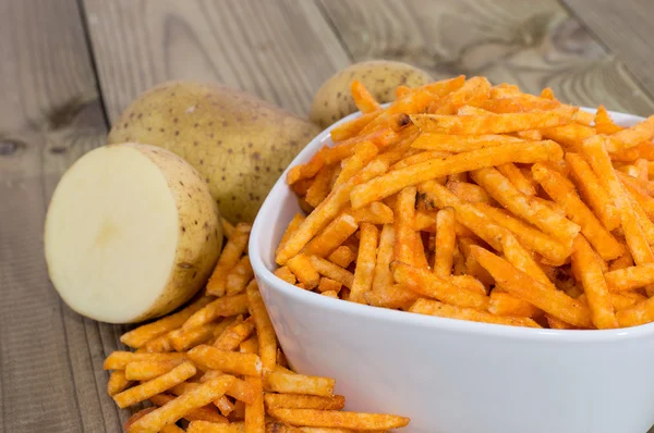 Potato Sticks with Potatoes in a bowl — Stock Photo, Image