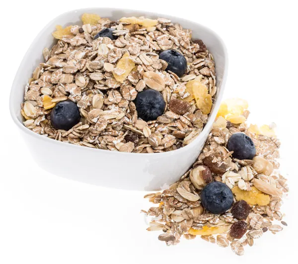 Mixed Muesli in a bowl isolated on white — Stock Photo, Image