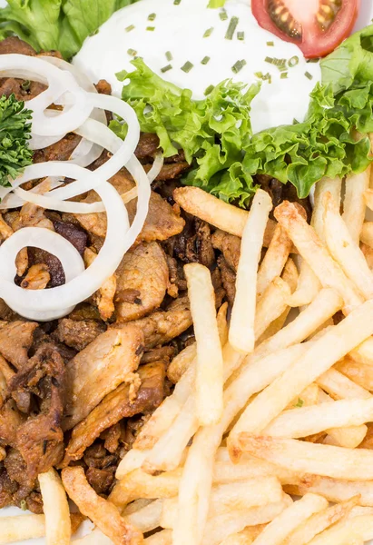 Portion of Kebab meat with Chips (macro shot) — Stock Photo, Image