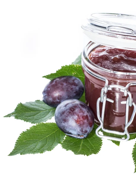 Glass with Plum Jam on white — Stock Photo, Image