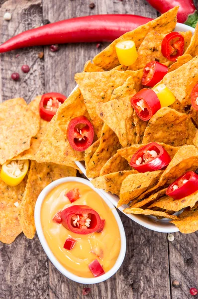 Bowl with Nachos and Cheese Sauce — Stock Photo, Image