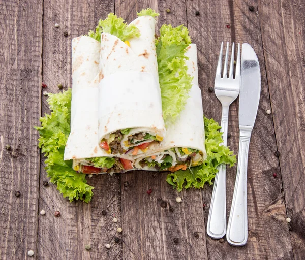 Heap of Wraps em madeira — Fotografia de Stock