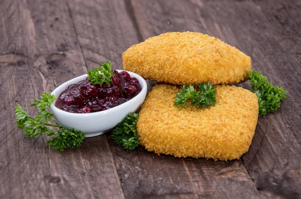 Portion of fried Gouda on wood — Stock Photo, Image