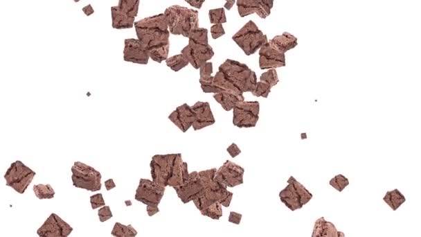 Brownies vallen en de vormgeving van een hart — Stockvideo