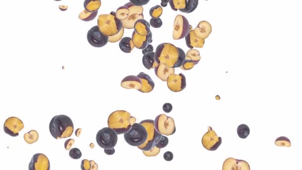 Falling plums shaping heart — Stock Video